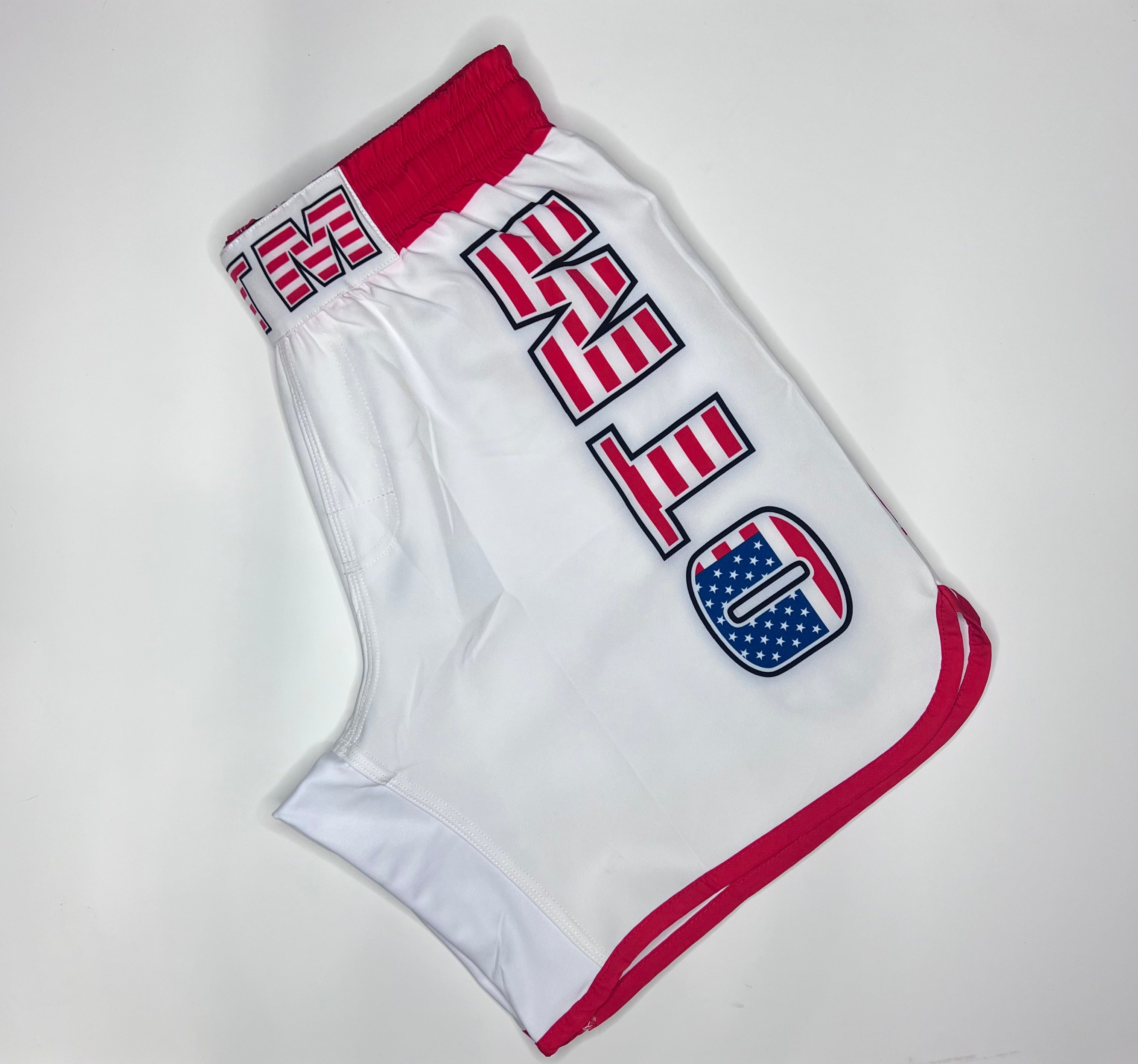 OTM USA Fight Shorts white with red and blue graphics, lightweight MMA and grappling shorts from OTM Fight Shop.
