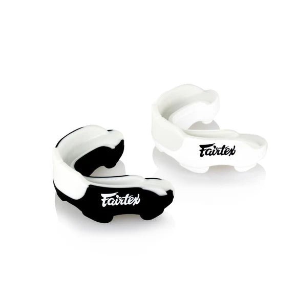 Fairtex Gel Mouthguard black and white models, dual-layer gel-fit design for boxing, MMA, and Muay Thai protection